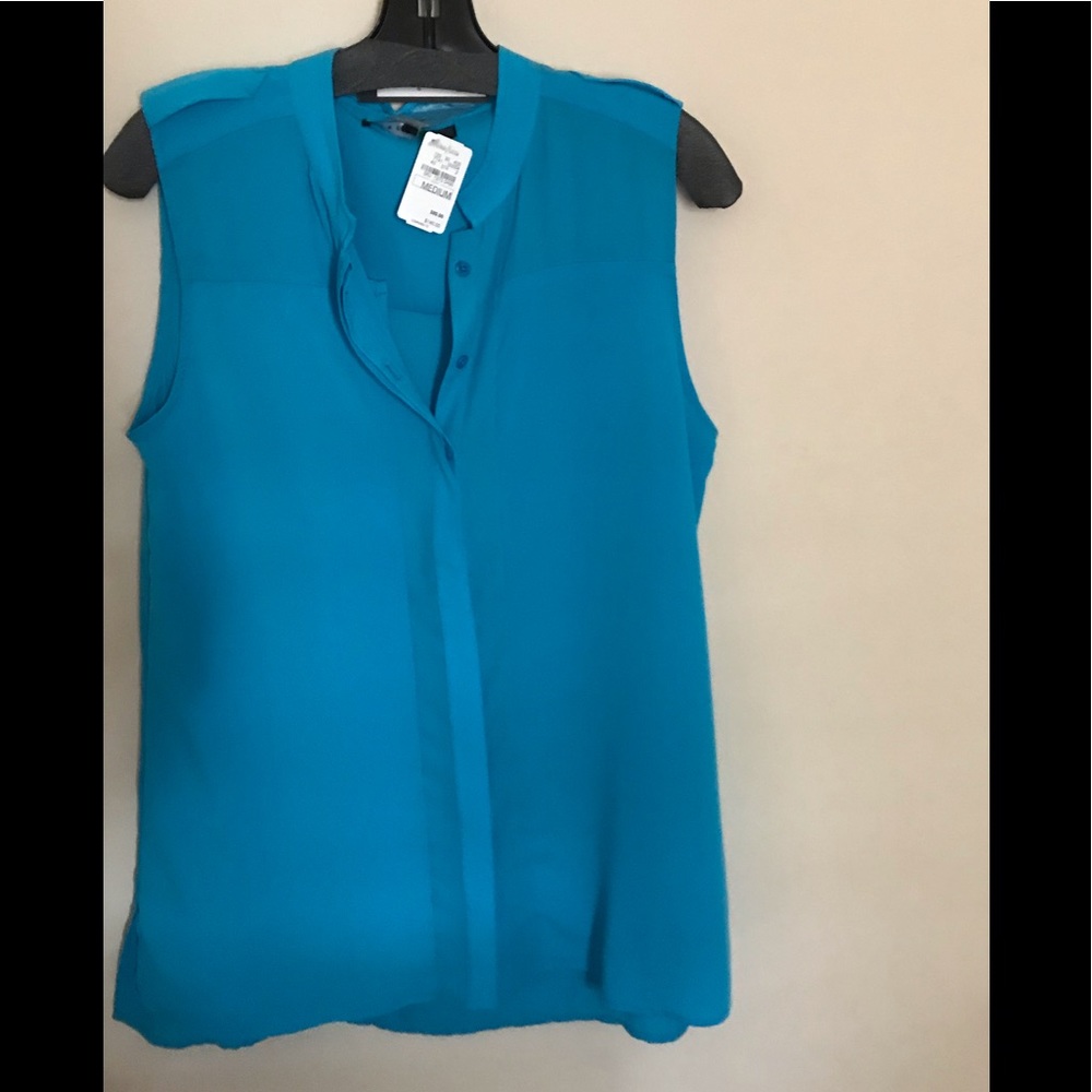 Sleeveless button down blouse